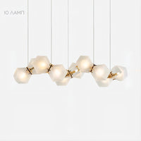 PHILLIS Linear Chandelier by Lampadom - ambient shot